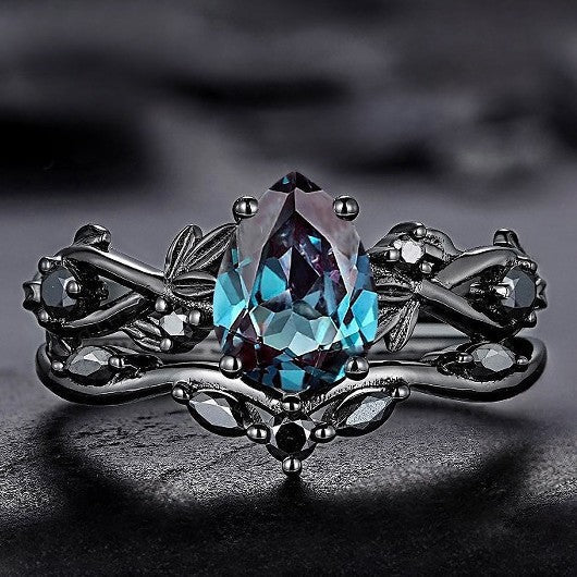 Gold ring with blue glass inlay